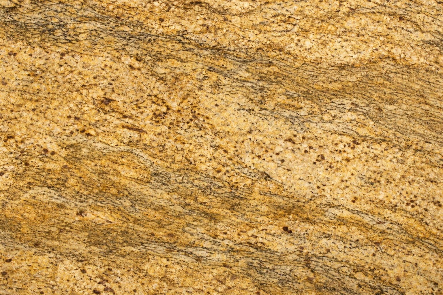 Warm gold Giallo Ornamental granite with flowing amber veining