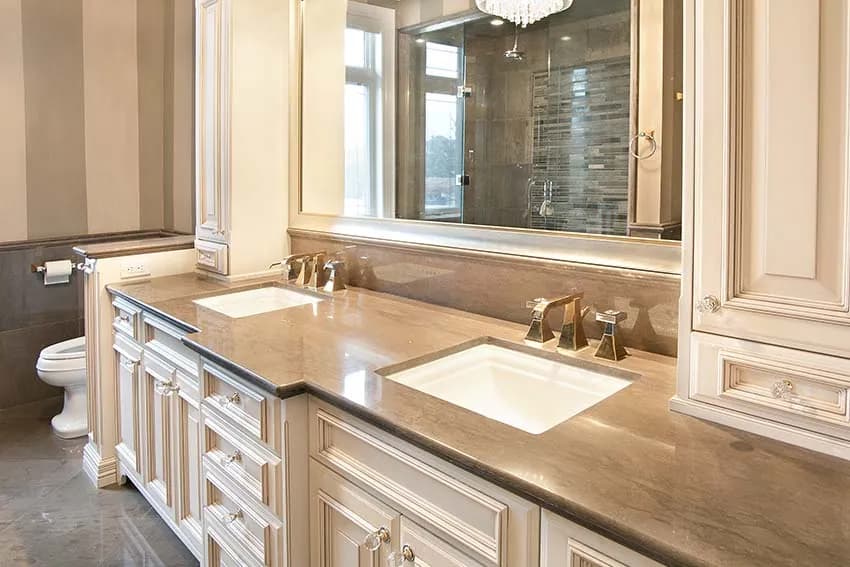 Polished brown stone vanity top with two sinks