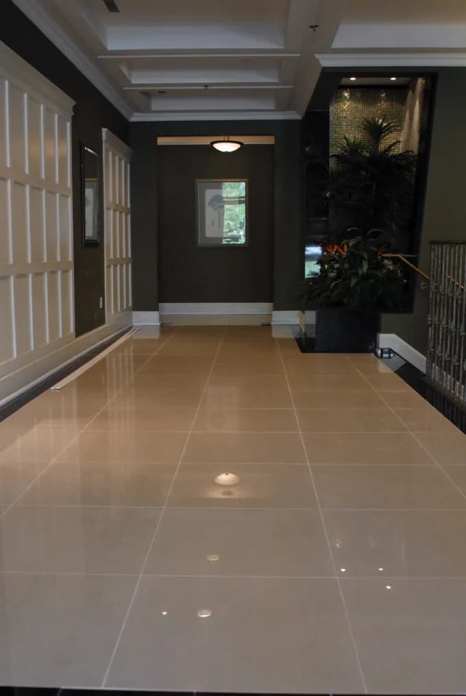 Glossy tile floor in a condo building corridor