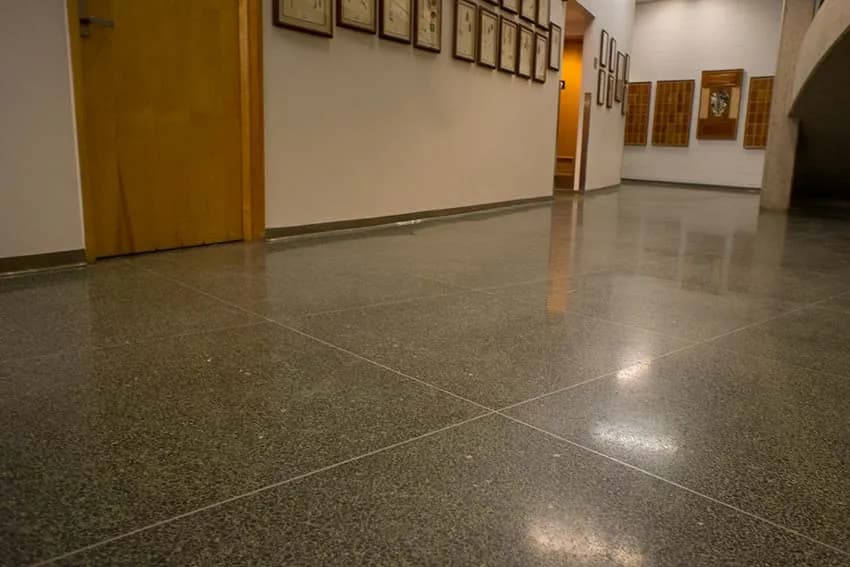 Polished dark terrazzo corridor floor