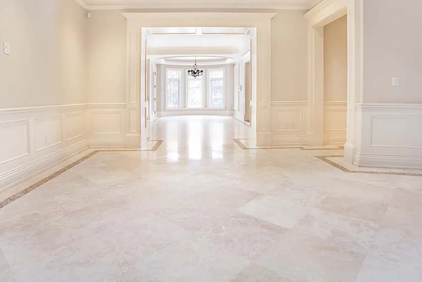 Polished marble floor running through several open rooms
