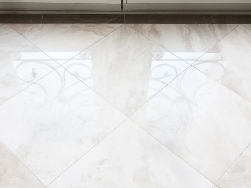 Dull marble foyer floor, before