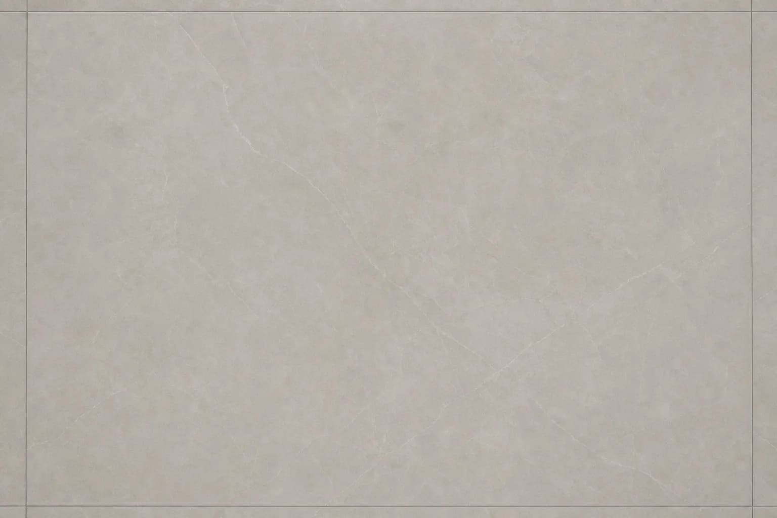 Large-format porcelain floor tile with soft grey veining