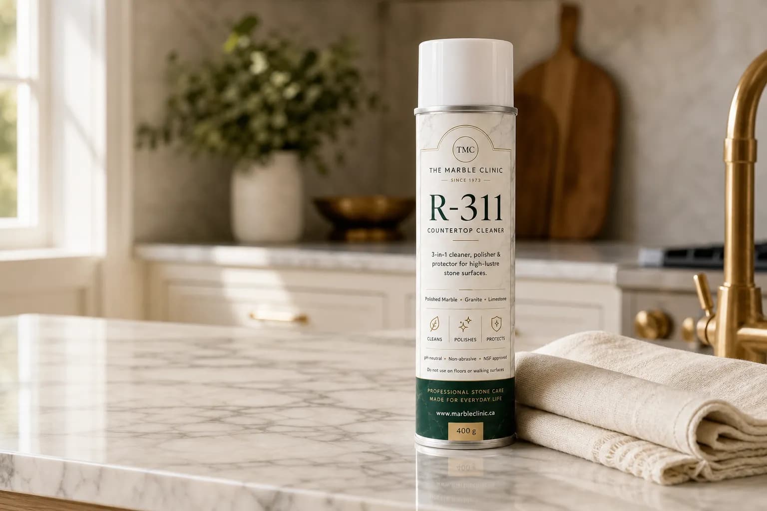 R-311 countertop cleaner on polished marble kitchen island