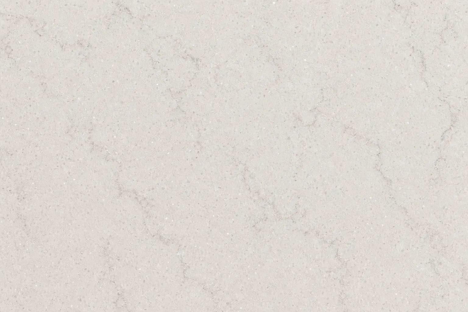 Engineered quartz countertop with fine grey speckle pattern