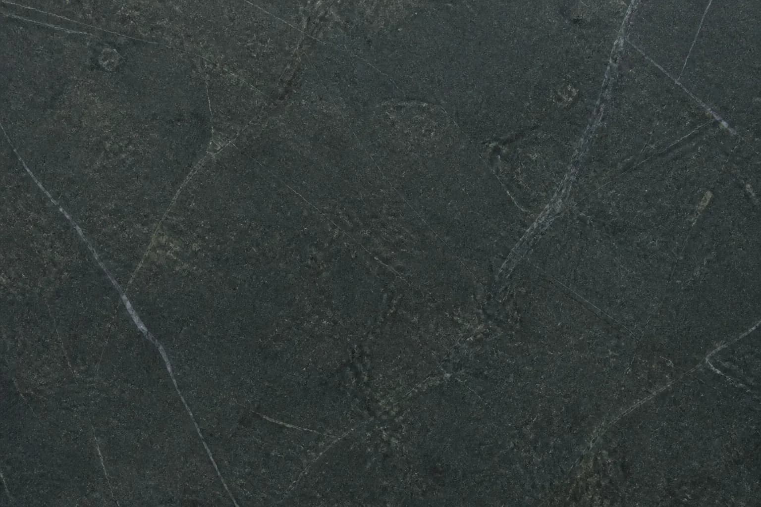 Dark soapstone countertop with soft matte charcoal tone