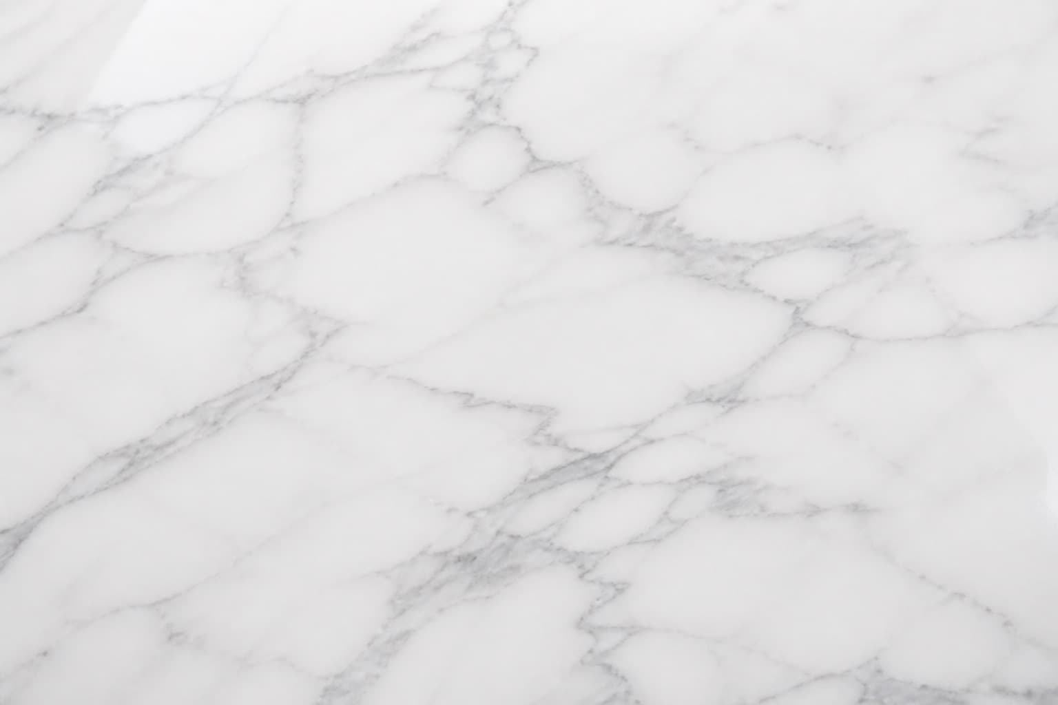 Carrara-style white marble with soft grey veining