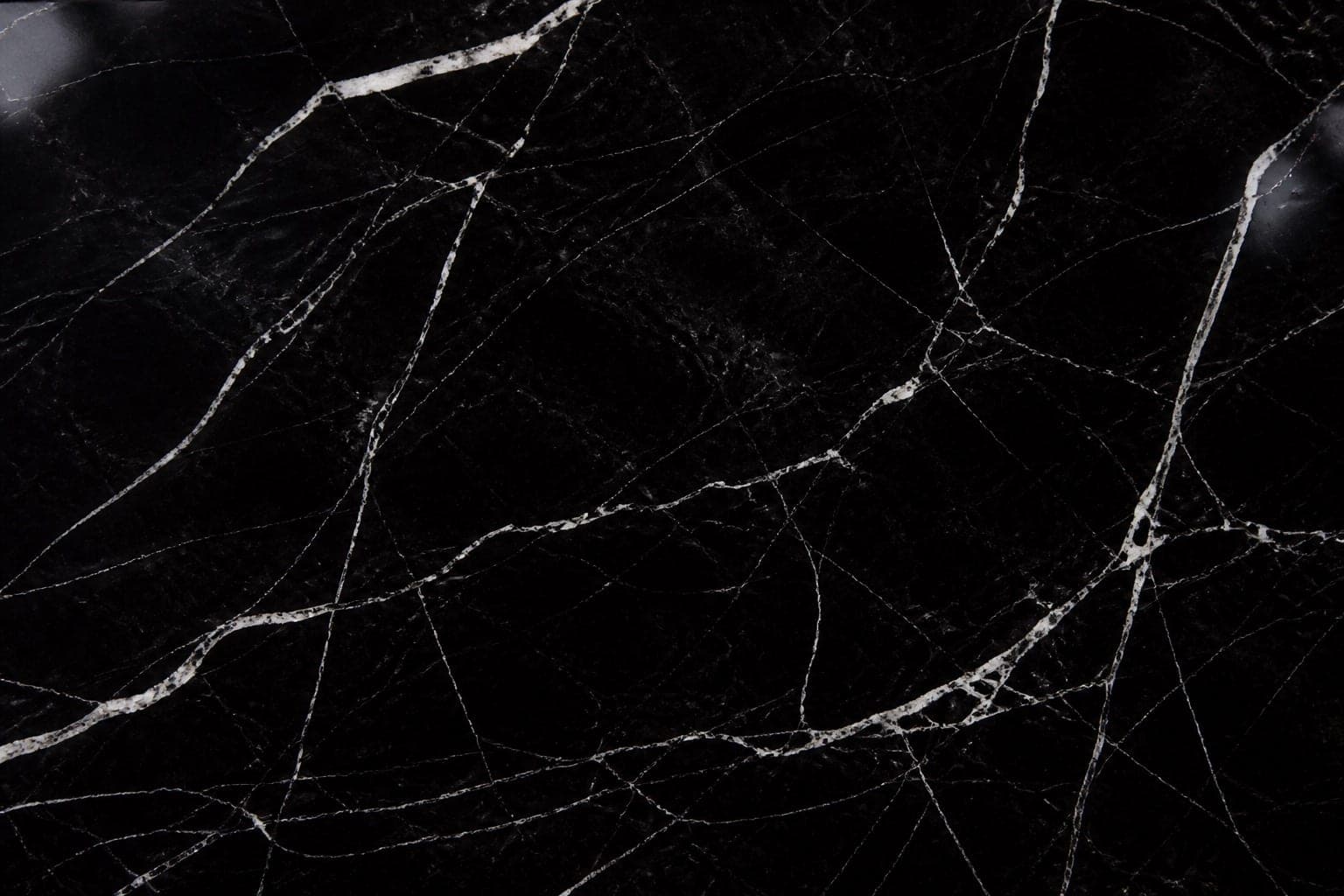 Black marble floor with white veining