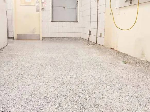 Rust-stained terrazzo floor after restoration